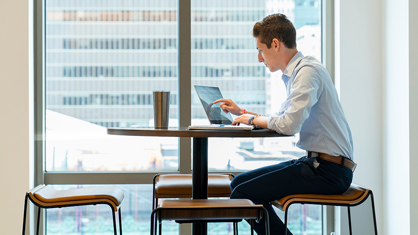 Image of student working on laptop.