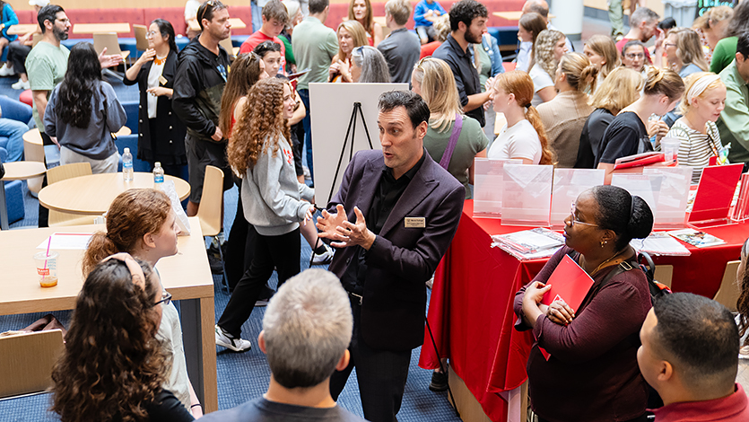 Image of prospective students and their families in the Dyson Center atrium on Sept. 27.