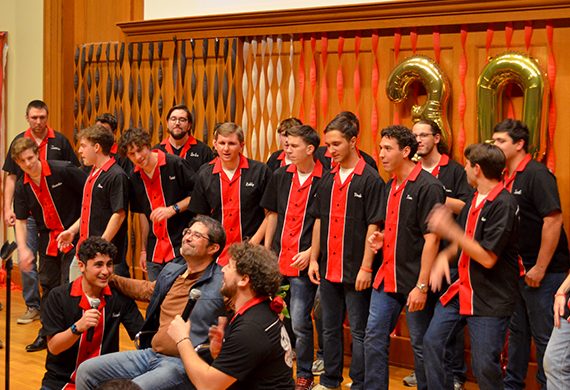 Members and alumni of Time Check serenade choral professor Bryan Lynch during the group’s 30th Anniversary Concert. Photo by Cira Shaw '26/Marist University. 