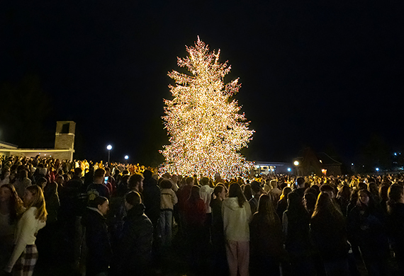 Students around Holiday Tree at Marist University. 