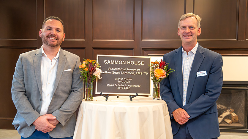 Chris Magro, nephew of Brother Seán Sammon (left), and President Kevin Weinman at the dedication of Sammon House. Photo by Benson Delaney ’27/Marist University.