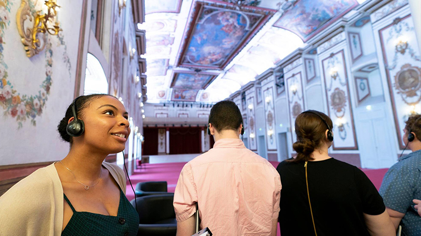 Image of Kelly Peaks '18 in Austria listening to a tour