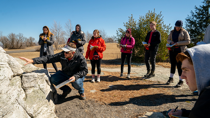 Dr. Zion Klos with his class at Minnewaska State Park