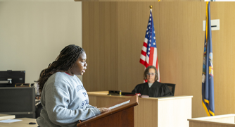 Marist University Summer Pre-College Crime and Justice Studies student in the Mock Court Room.