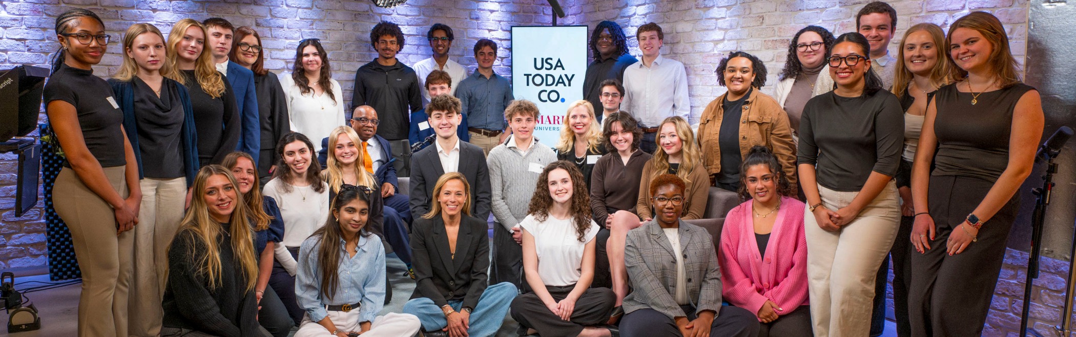 Image of students with Lark-Marie Anton in the USA TODAY studio.