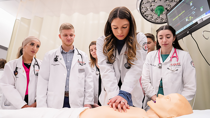 Students in Marist’s Physician Assistant program practice CPR techniques. Photo by Nelson Echeverria/Marist University.