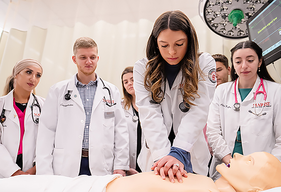 Students in Marist’s Physician Assistant program practice CPR techniques. Photo by Nelson Echeverria/Marist University.