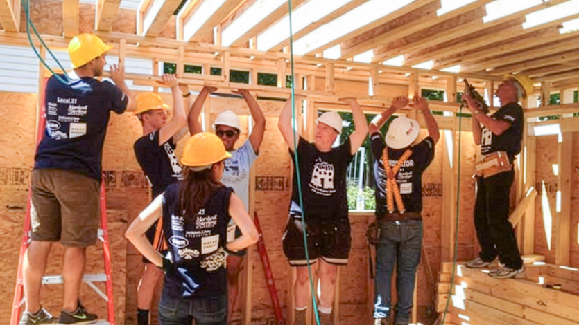 Image of Marist volunteers participating in a Habitat for Humanity site build.