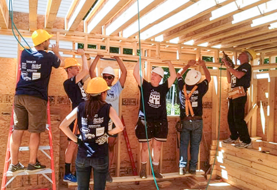 Image of Marist volunteers participating in a Habitat for Humanity site build.