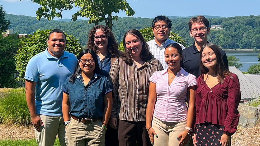 Tori Hegenauer ‘27 (bottom right) and her Tarver cohort in front of the Hudson River after their final presentations. Photo by Dr. Melissa Gaeke/Marist University. 