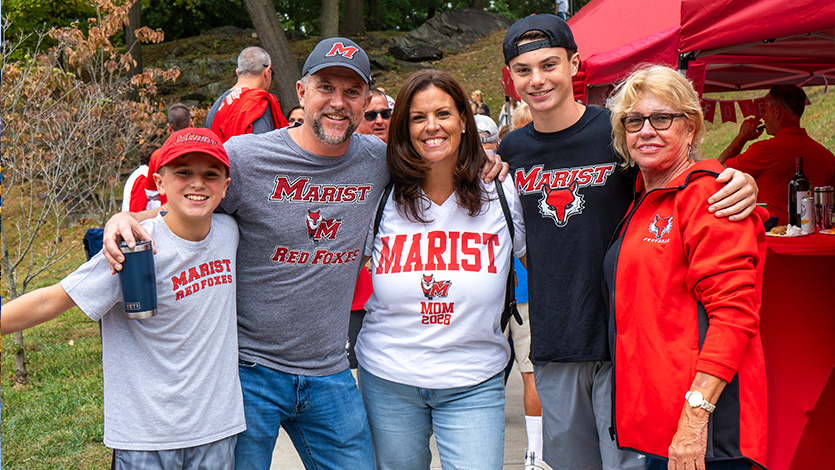 Image of family on campus for Family Weekend festivities.