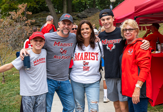 Image of family on campus for Family Weekend festivities.