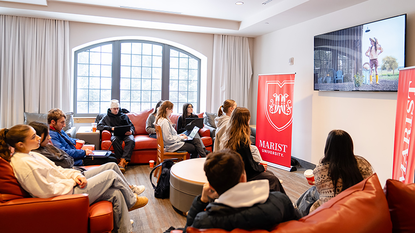 Marist students gather in Ward Hall to watch and rate Super Bowl Ads. Photo by Nelson Echeverria/Marist University. 