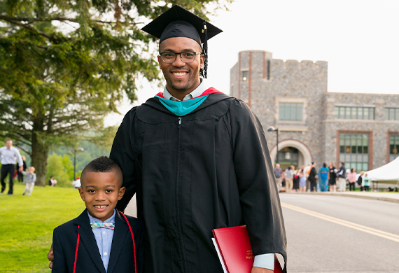 image of marist adult graduate with child