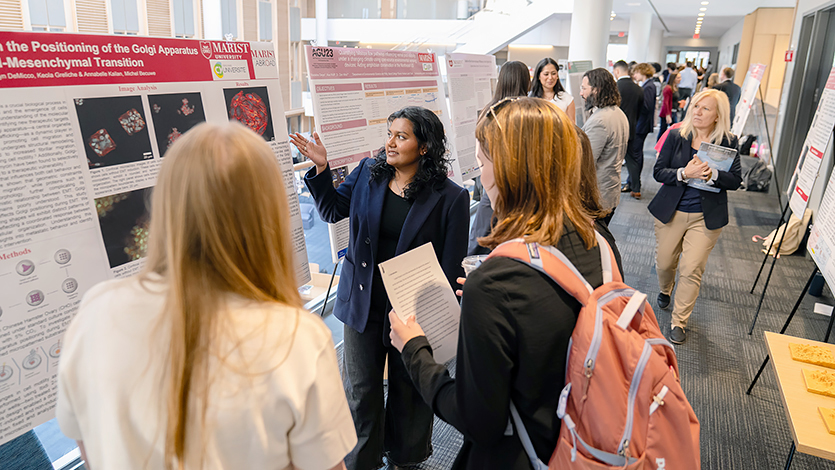Annabelle Kailan '26 presents research on Golgi apparatus positioning at CURSCA in the Dyson Center, mentored by Prof. Michel Becuwe. 