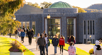 Image of Marist University community members walking on campus