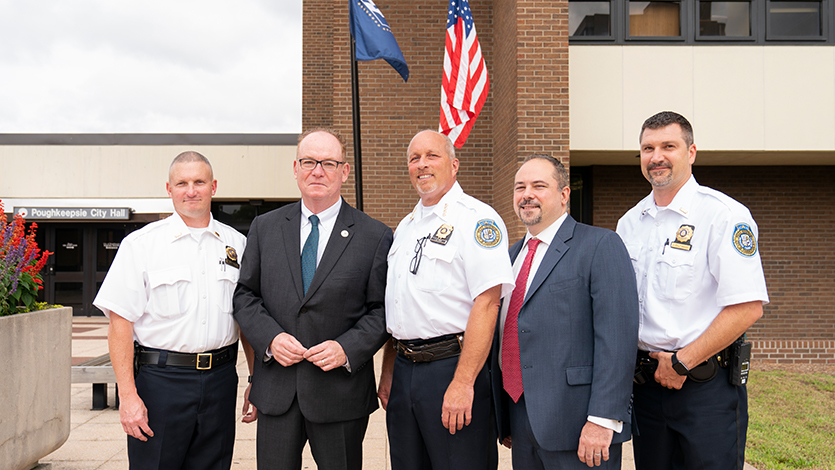 Poughkeepsie mayor Rob Rolison and city official with assistant professor Frank Merenda