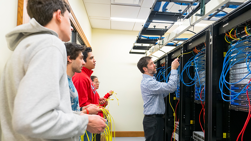 Image of computer science students working.