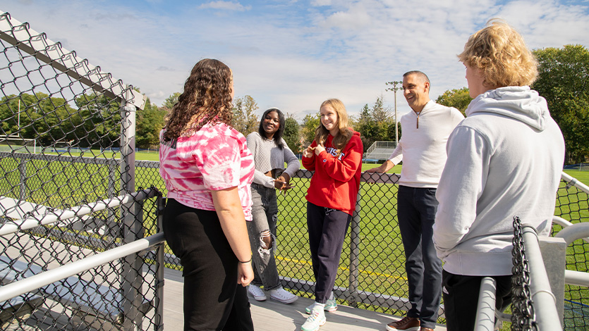 Image of John Liporace visiting with the students at Hoosick Falls High School. 