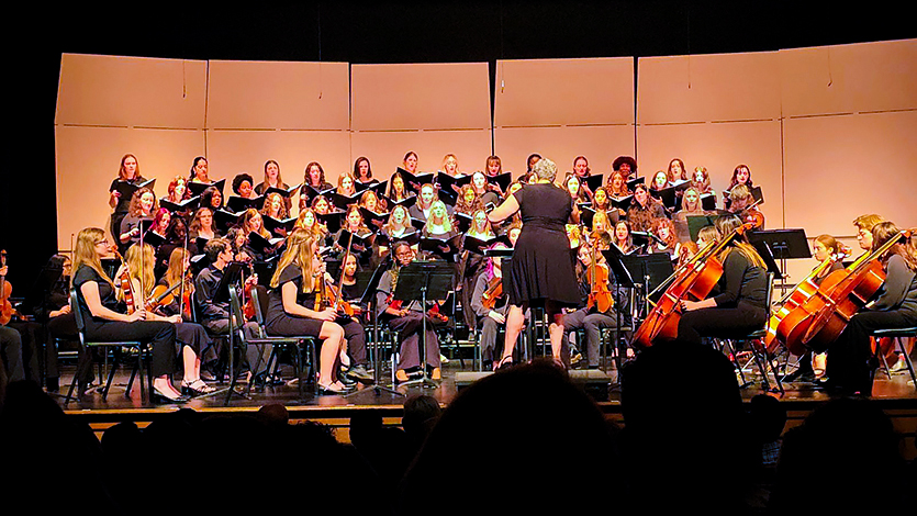 Image of Sarah Williams conducting the fall 2024 Family Weekend Concert.