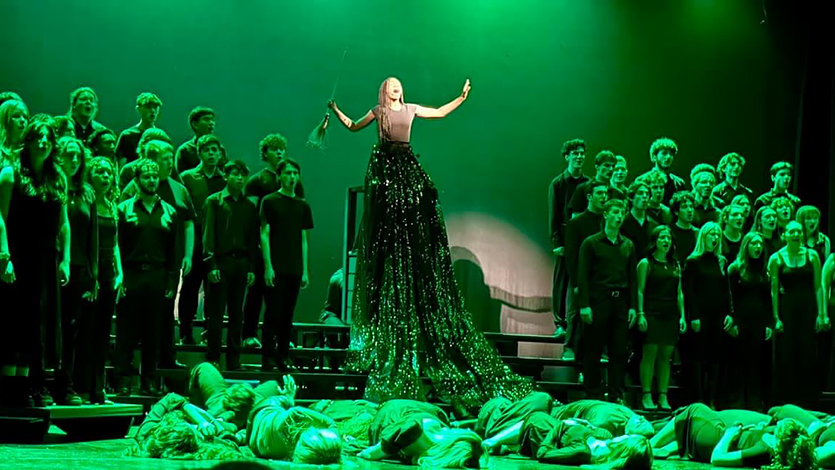 Image of The Marist Singers performing Defying Gravity from “Wicked” at Night on Broadway.