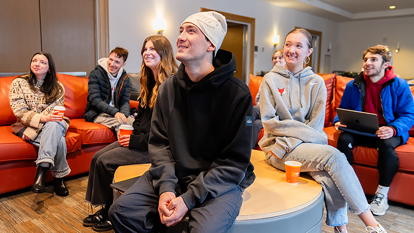 Image of Marist students in Ward Hall to watch and rate Super Bowl Ads. 