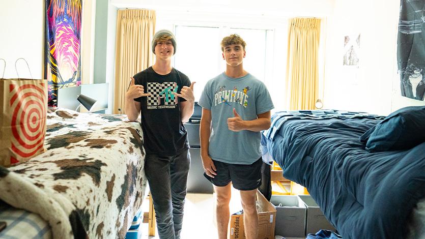 Image of students in their dorm room.