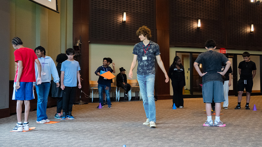 Image of Aidan Parascando '26 organizing a game for the Marist Liberty Partnerships Program.