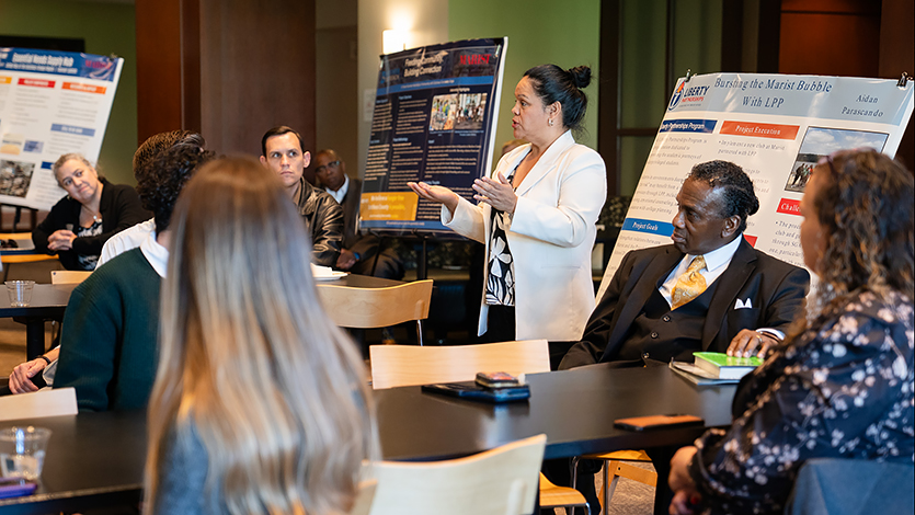 Gabriela Vega-Matthews, founder and CEO of Casa Comunitaria de Recursos speaks at 10 Years of Tarver event
