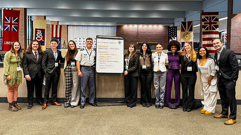 Image of Dr. Juris Pupcenoks with the group he co-chaired at the SCUSA conference.