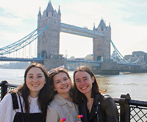 Marist University image: Students pose in London with Tower Bridge in background.