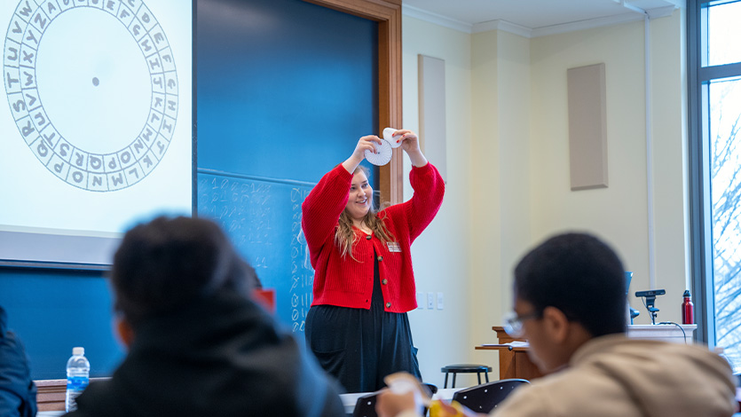 Image of Melissa Chodziutko leading the Cracking Codes workshop.