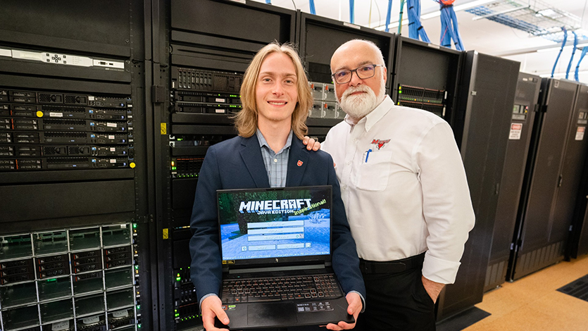 Image of Noah Yurasko alongside Professor Chris Algozzine in the Enterprise Computing Research Lab.