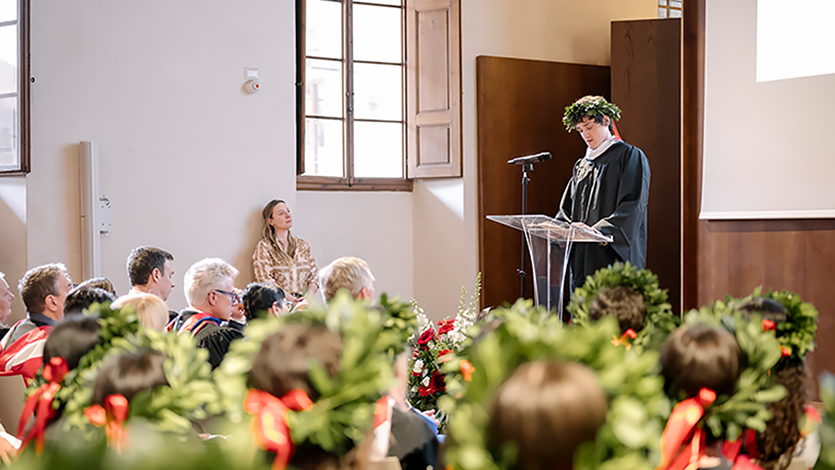 Image of Theodore Lance '26 speaking at Marist Italy Commencement.