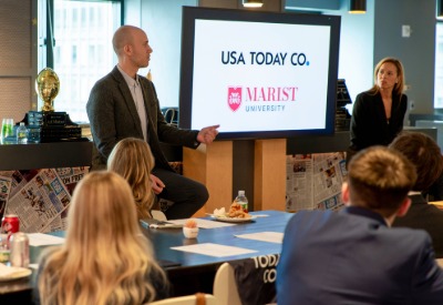 Image of Paul Myerberg speaking to the student group.