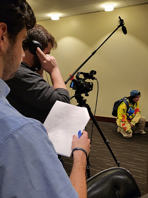 Image of Marist University's MCTV club members filming.