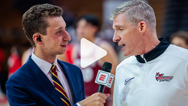 Image of William Rosen conducting an interview with "play" icon.